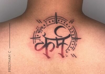 Karma back tattoo