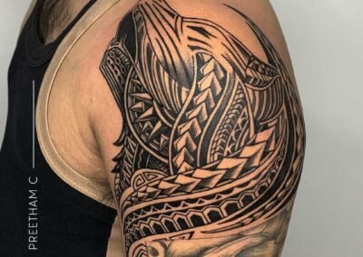 Trbal wolf shoulder tattoo