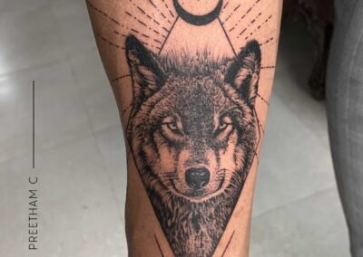 Wolf with half moon forearm-tattoo-